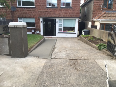 Property Repair Guys 365 drive way works with poured concrete and newly ereceted concrete pillar