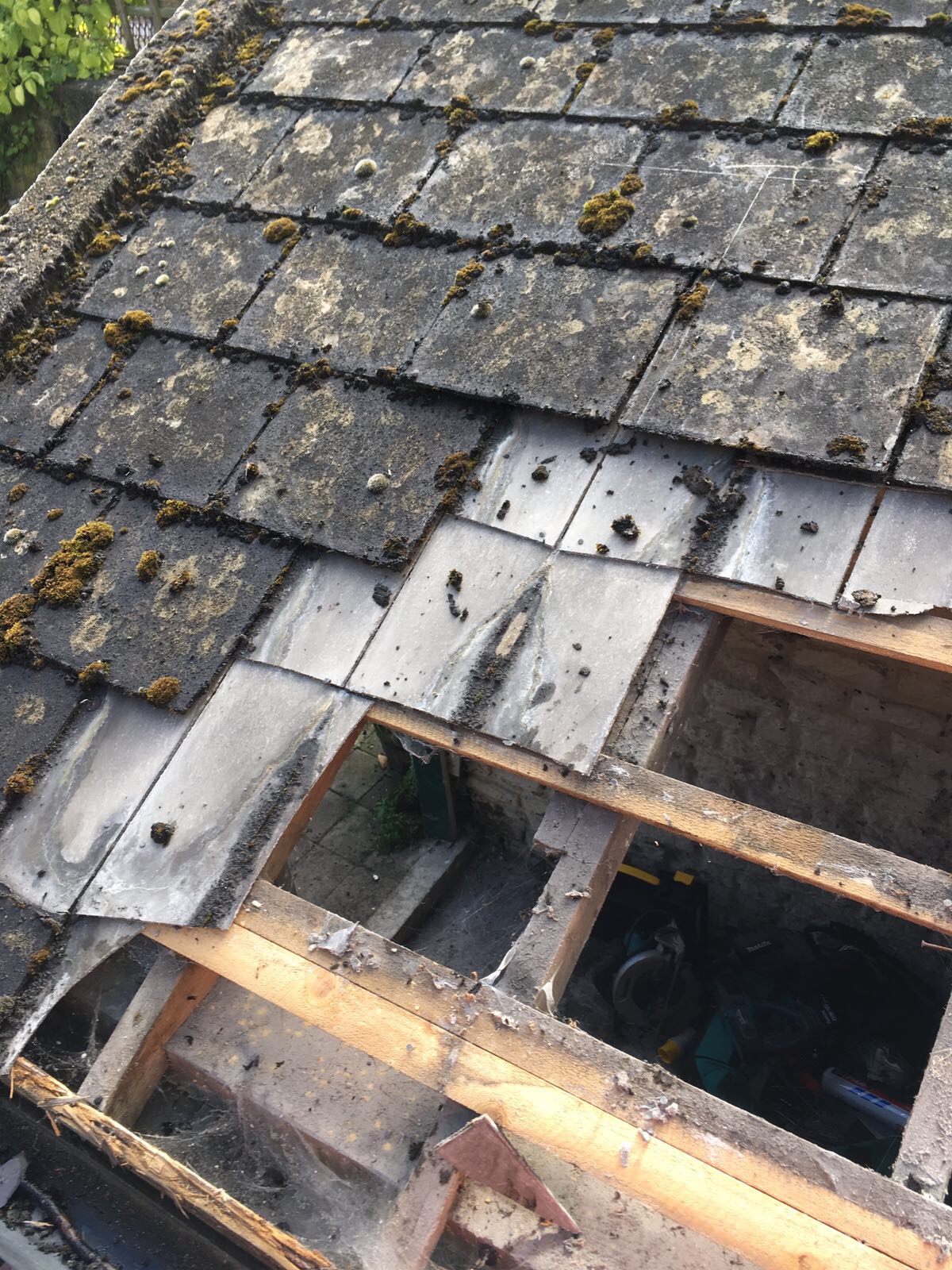Property Repair Guys 365 Roofing removal of old perished slates and capping slates