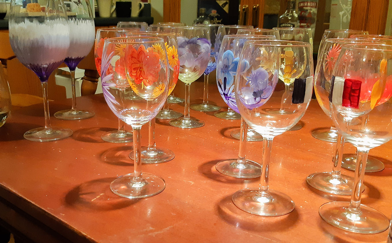 various painted wine glasses