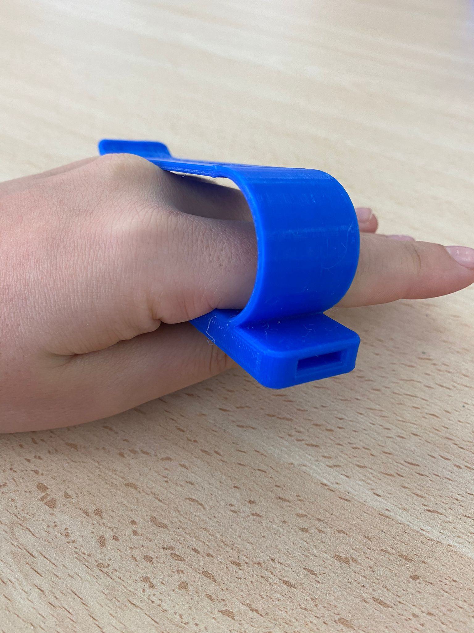 Pinza palmar para cubiertos