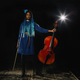 Millicent B James and her cello, Penelope.jpeg