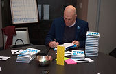 Jamie Ramsden Signing Books.jpg