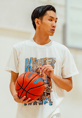 Basketball Trainer explaining the drill to a player