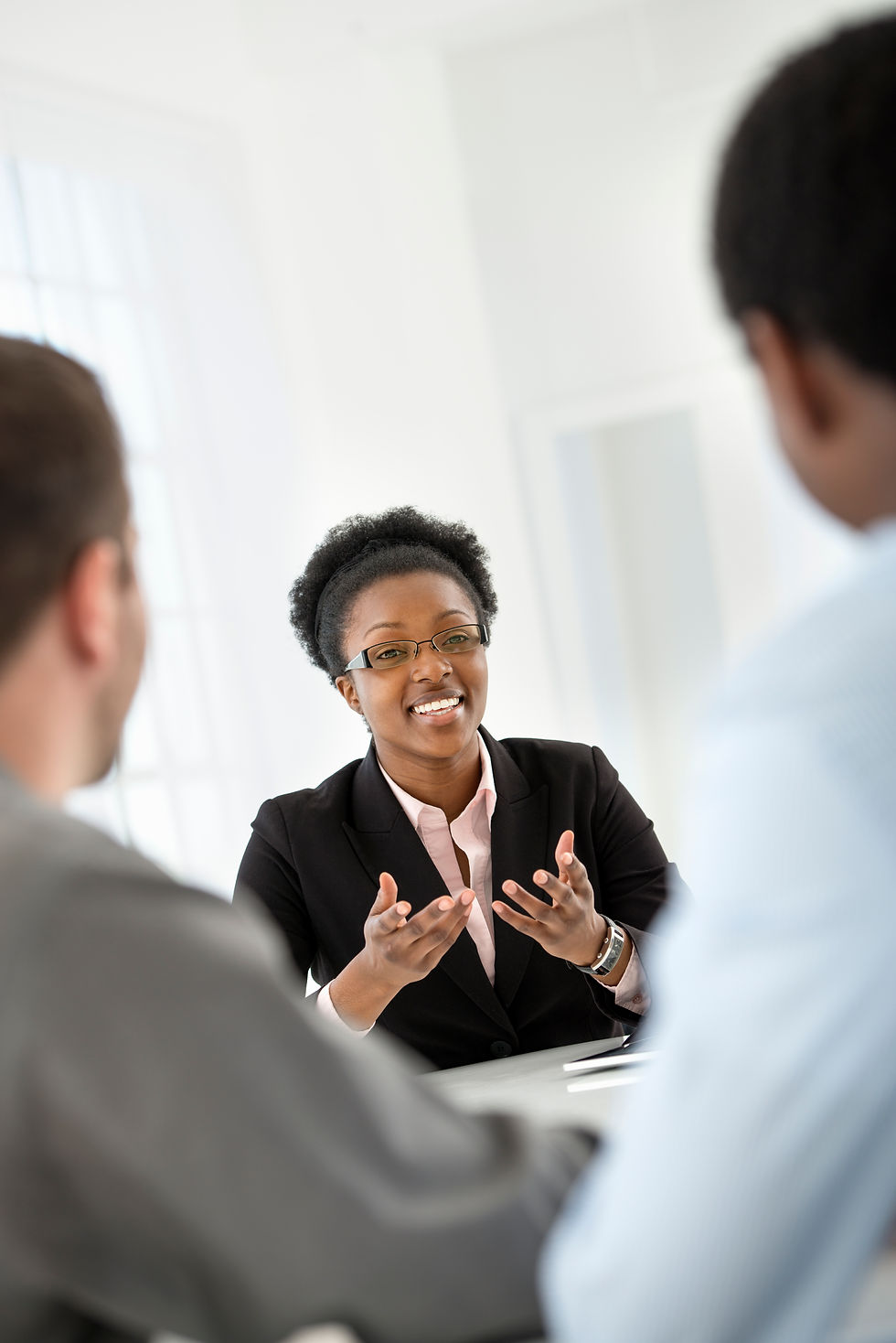 real estate agent woman discussing business and tax strategies in a meeting
