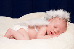 Baby dressed as an angel