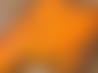 sweet potato shepherd's pie in a glass casserole dish. corn, carrots, and ground beef are visible in the slice.