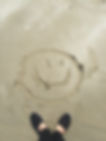 smiley-drawing-on-sand-698899.jpg
