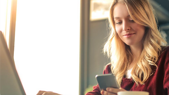 girl-looking-at-her-phone