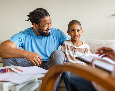 Supervised visitation meeting between father and young son
