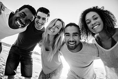Group of diverse friends on beach