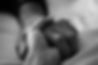Closeup of two people holding hands