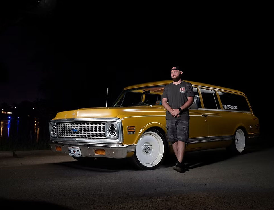 Brandon in front of 72 subruban