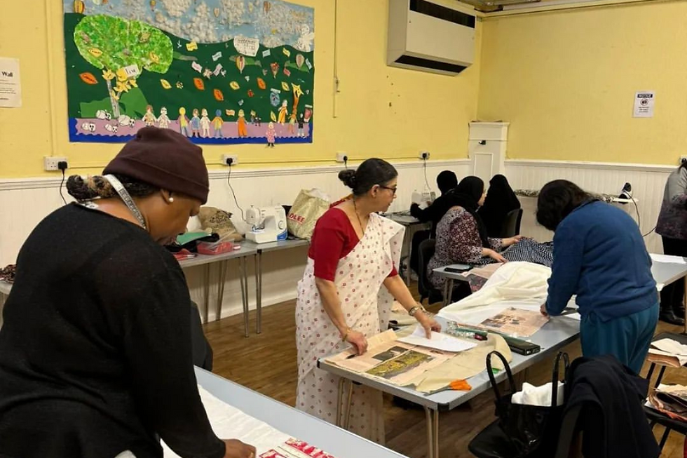 Members of our Garment Workers project working on a variety of textiles and garments.