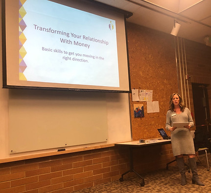A woman giving a power point presentation