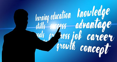 Silhouette pointing to the words: Learning, Education, Knowledge, Skills, Success, Advantage, Goals, Process, Job, Career, Growth