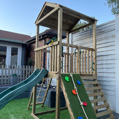 Climbing frame in Westhoughton Bolton. With slide, climbing wall, ladder, rope ladder, roof