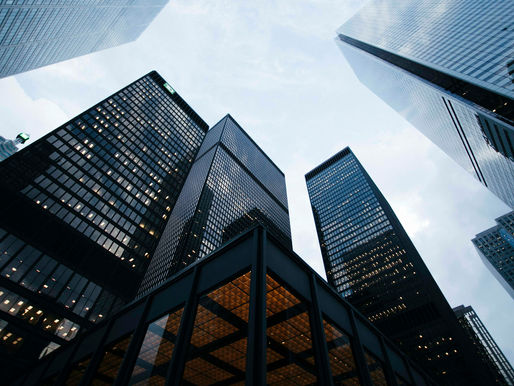 Corporate office towers illustrating NCLT merger and scheme of arrangement under Sections 230-232 of the Companies Act