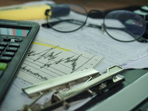 Corporate finance desk illustrating share buyback taxation and capital gains under the Income-tax Act 2025