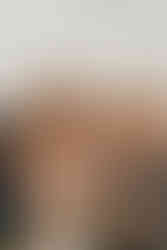 Bride and her mom laugh while sharing a special dance.