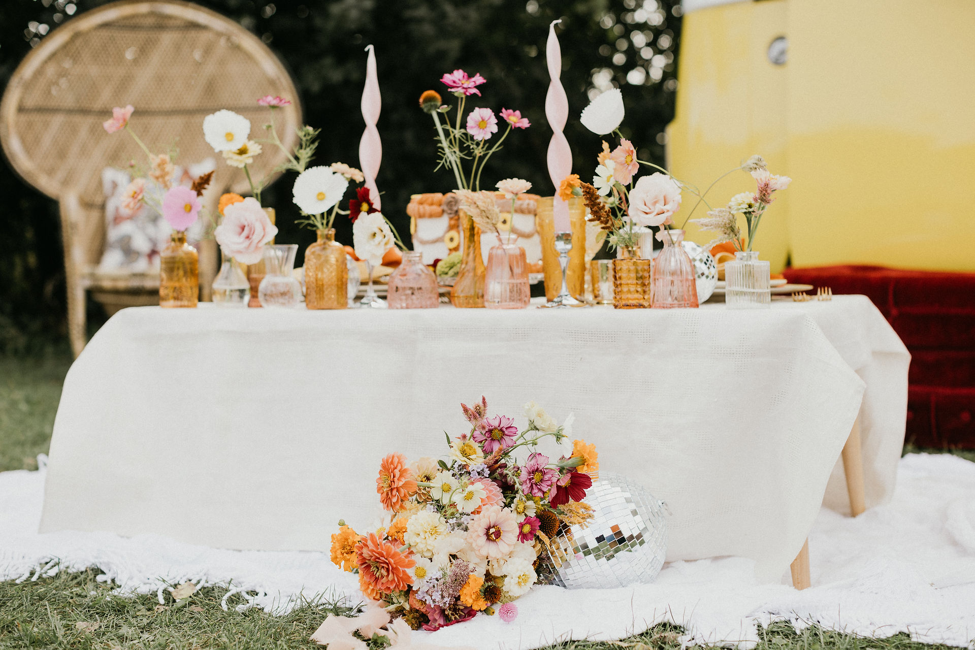 Wildflower-style blooms by North Road Flower Farm added soft, natural beauty to this retro-iWildflower-style blooms by North Road Flower Farm added soft, natural beauty to this retro-inspired wedding , Osh Post Events rental items