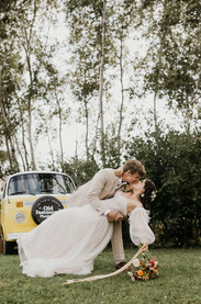 The bridal gown from Tiffani’s Bridal of Appleton flowed like a dream — vintage elegance with a modern silhouette.