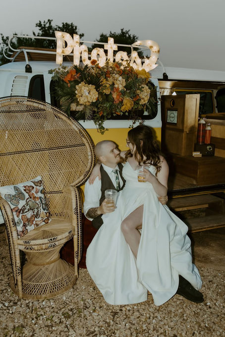 Harvest Moon Pond | Photos by Megan Kellie Photography, bride and groom pose in front of a yellow vintage VW Photo Booth 