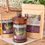Thumbnail: Loose Leaf Tea Jars Spring Cottage Collection surrounded by books and flowers