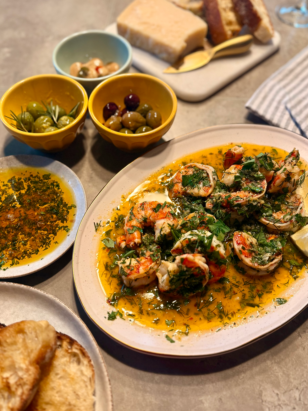 Italian antipasto spread featuring lemon herb grilled shrimp