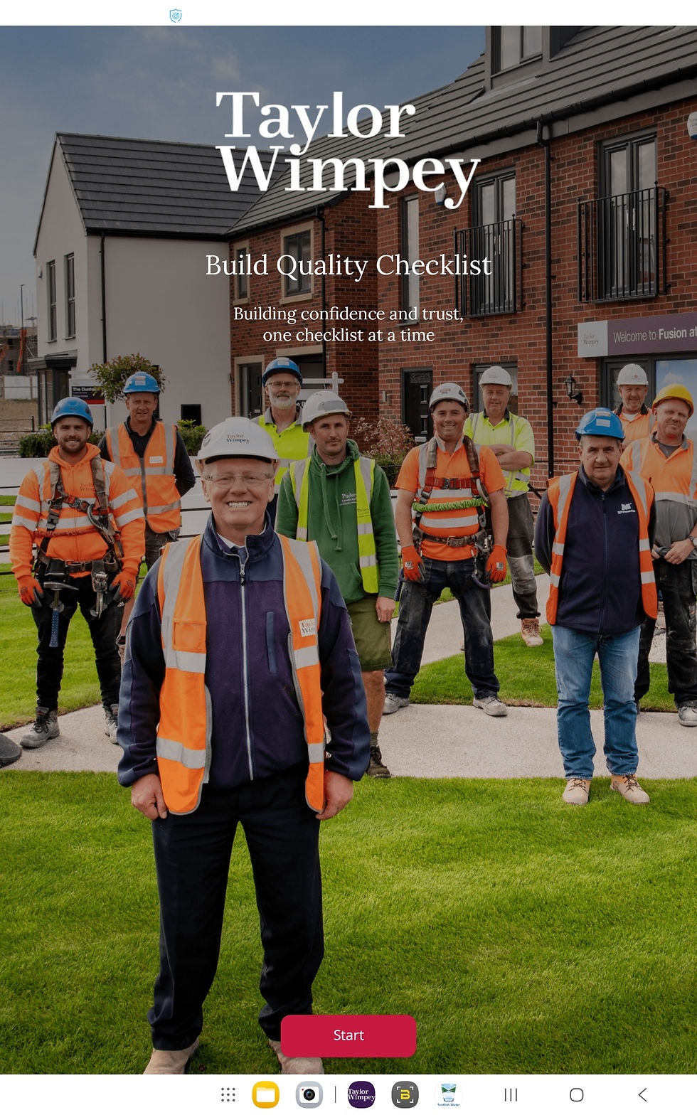 Construction workers in safety gear stand on green grass in front of brick houses. Text: Taylor Wimpey Build Quality Checklist.