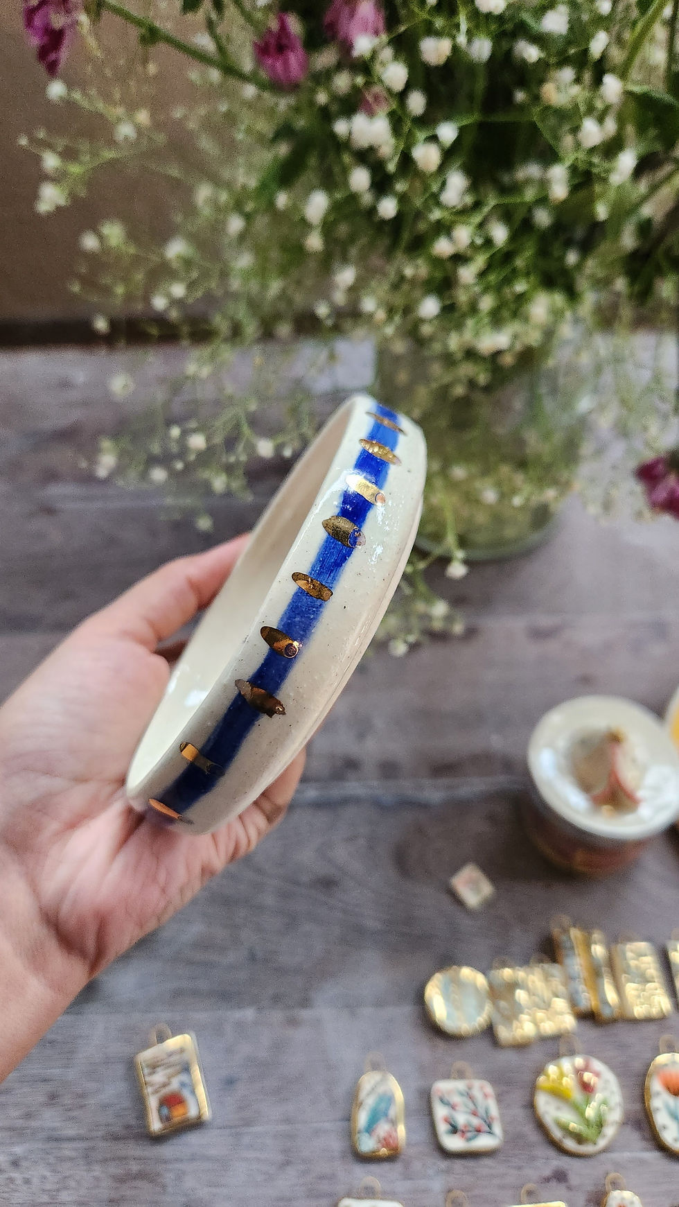 Thumbnail: Blue, Gold, White Teepee Hut with Plate
