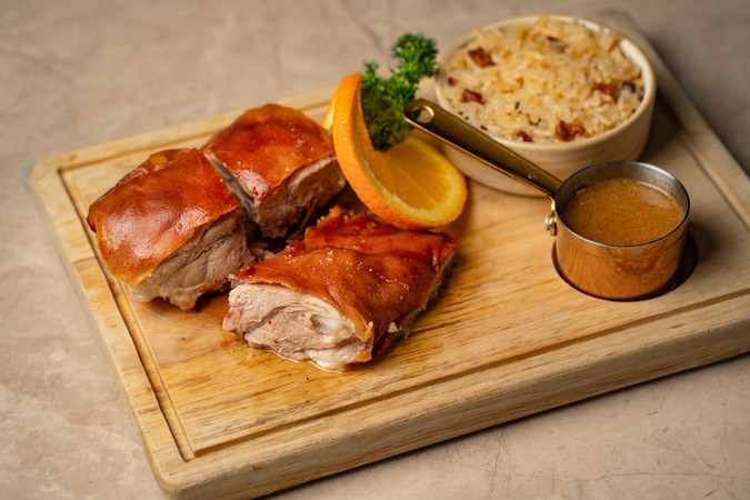 Slow-roasted suckling pig; Image courtesy of Casa Lisboa