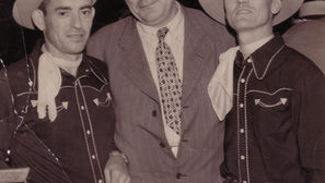 The Briarhoppers, Whitey and Hogan, with announcer Charlie Crutchfield at WBT Radio