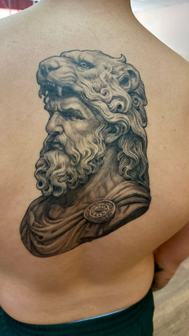 Hercules lion cowl back piece black and grey tattoo greek mythology