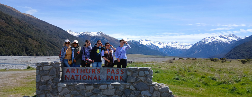 Ladies at the Arthur's Pass National Park sign