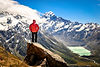 Mt-Cook-Man-on-rock-above-lakes.jpeg