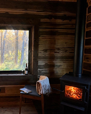 cabin fireplace lit bodhi farms.jpg
