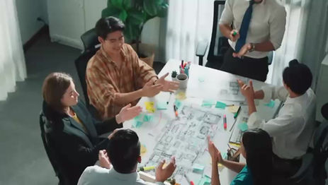 A speaker explains how the roles in the drama triangle—victim, persecutor, and rescuer—are rooted in childhood survival patterns and how understanding your default role can help you break free from recurring conflict cycles.