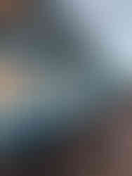 photo of the side of a roof under construction, blue timber battens on the fascia edge of a flat roof