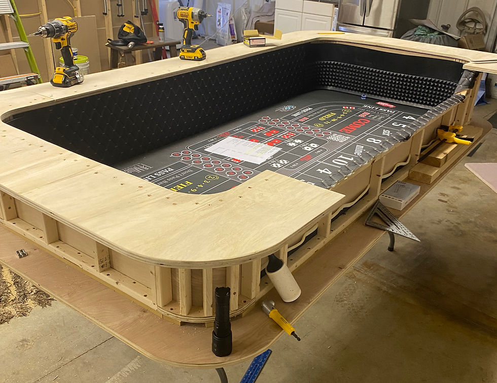 Sub-rail as the base for craps table arm rest and chip rail.