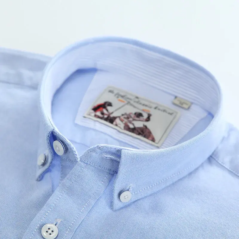 Thumbnail: Chemise Homme Oxford en Pur Coton – Manches Longues, Coupe Ajustée, Style Décontracté pliée col vue de face