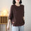 Miniature : Femme portant un Pull Ample et Solide move