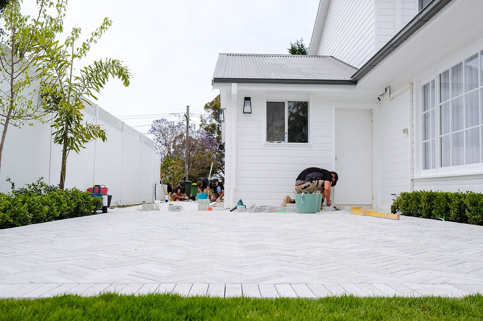 Sydney's best landscapers laying herringbone batten paving 