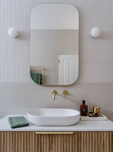 Jannali warm neutral bathroom renovation with timber vanity by Shire Build.