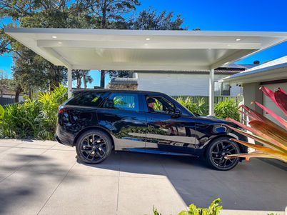 Luxe Cantilever White Carport with Black car