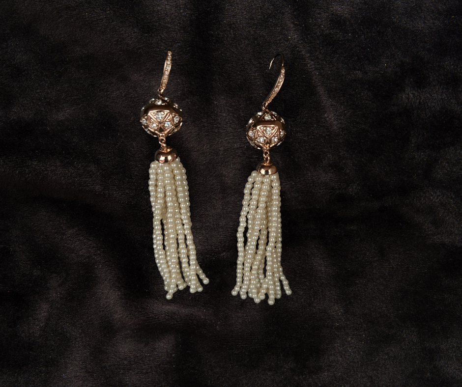 Thumbnail: Gatsby Chandelier  Earrings hanging on a black felt display
