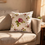 Thumbnail: Hobbytex English Rose Cushion Cover placed on a couch.