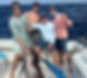 Group of anglers on No Madda Charters posing with a giant swordfish during an offshore fishing trip out of Fort Lauderdale
