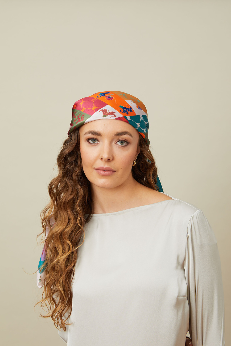 Shobha printed silk scarf by Kalpanik worn on the head by a model