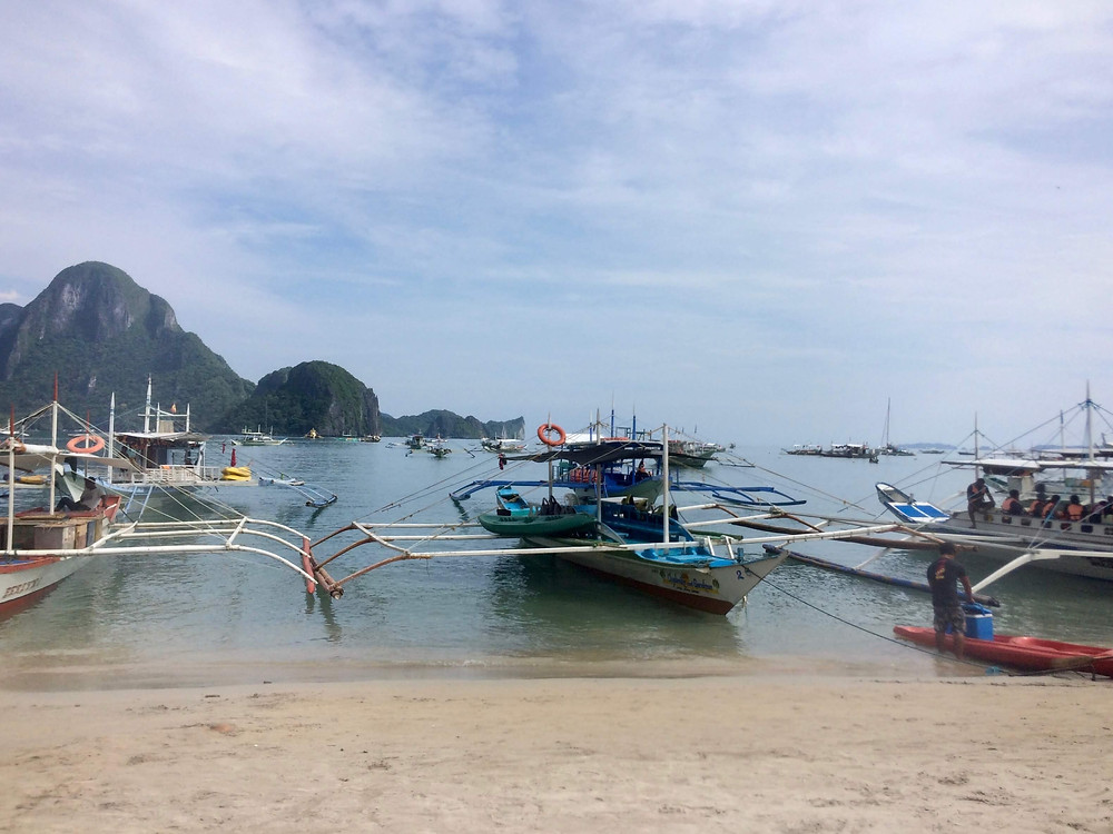 Beach and traditional wooden boats