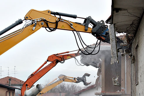 tractor destroying building